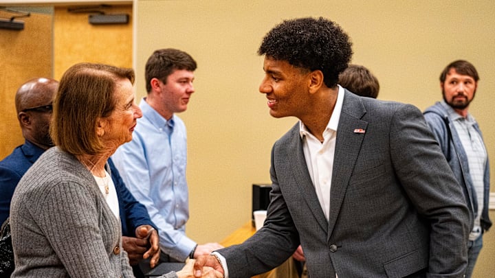 Ole Miss quarterback Trinidad Chambliss shakes hands with a supporter after the hearing of Chambliss in his lawsuit against the NCAA at Calhoun County Courthouse in Pittsboro, Miss., on Thursday, Feb. 12, 2026. Chambliss was granted a preliminary injunction against the NCAA.