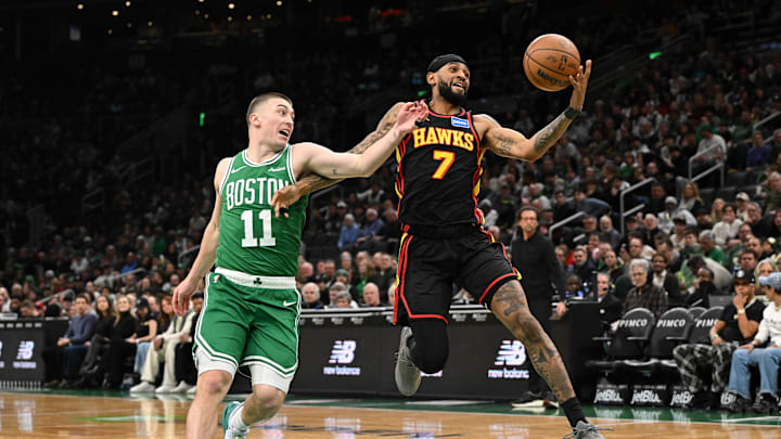 Jan 28, 2026; Boston, Massachusetts, USA; Atlanta Hawks guard Nickeil Alexander-Walker (7) attempts a basket against Boston Celtics guard Payton Pritchard (11) during the first half at the TD Garden. Mandatory Credit: Brian Fluharty-Imagn Images Jan 28, 2026; Boston, Massachusetts, USA; Atlanta Hawks guard Nickeil Alexander-Walker (7) attempts a basket against Boston Celtics guard Payton Pritchard (11) during the first half at the TD Garden. Mandatory Credit: Brian Fluharty-Imagn Images
