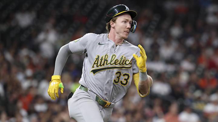 Jun 5, 2026; Houston, Texas, USA; Athletics center fielder Henry Bolte (33) runs to first base on a double during the sixth inning against the Houston Astros at Daikin Park. Mandatory Credit: Troy Taormina-Imagn Images