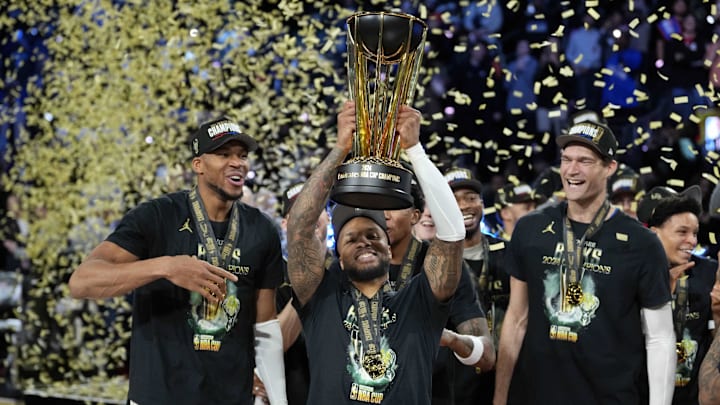 Dec 17, 2024; Las Vegas, Nevada, USA; Milwaukee Bucks forward Giannis Antetokounmpo (34), guard Damian Lillard (0) and center Brook Lopez (11) celebrate after winning the Emirates NBA Cup championship game against the Oklahoma City Thunder at T-Mobile Arena. Mandatory Credit: Kyle Terada-Imagn Images