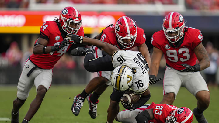 Oct 15, 2022; Athens, Georgia, USA; Georgia Bulldogs defensive back Daylen Everette (6) tackles Vanderbilt Commodores wide receiver Jayden McGowan (16) during the second half at Sanford Stadium. Mandatory Credit: Dale Zanine-USA TODAY Sports