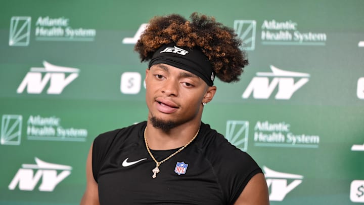 New York Jets quarterback Justin Fields (7) speaks at a press conference during minicamp at Atlantic Health Jets Training Center. New York Jets quarterback Justin Fields (7) speaks at a press conference during minicamp at Atlantic Health Jets Training Center.