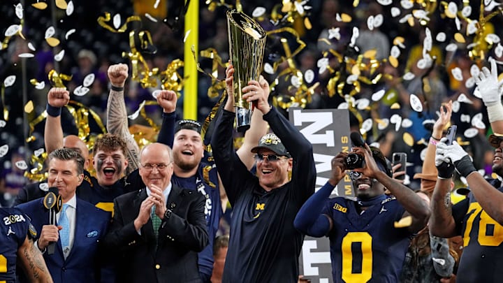 Jan 8, 2024; Houston, TX, USA; Michigan Wolverines head coach Jim Harbaugh celebrates with the CFP