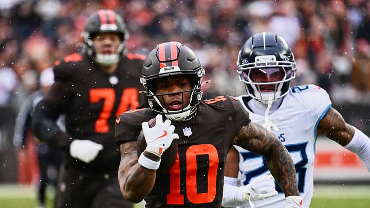 Dec 7, 2025; Cleveland, Ohio, USA; Cleveland Browns running back Quinshon Judkins (10) runs with the ball against Tennessee Titans safety Kevin Winston Jr. (23) during the first quarter at Huntington Bank Field. Mandatory Credit: Ken Blaze-Imagn Images Dec 7, 2025; Cleveland, Ohio, USA; Cleveland Browns running back Quinshon Judkins (10) runs with the ball against Tennessee Titans safety Kevin Winston Jr. (23) during the first quarter at Huntington Bank Field. Mandatory Credit: Ken Blaze-Imagn Images