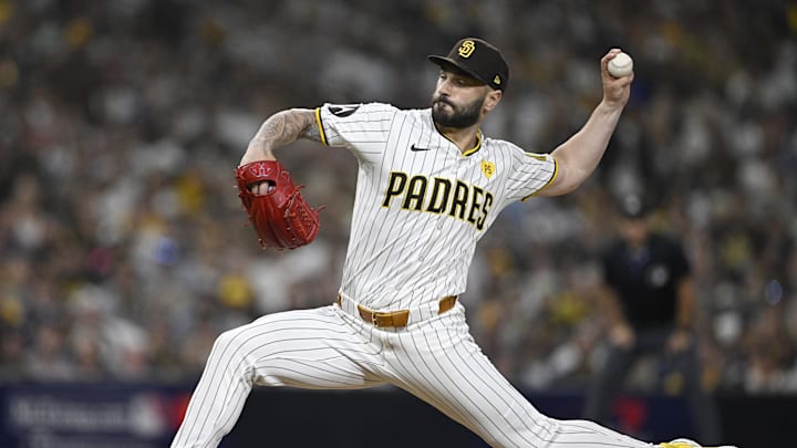Oct 2, 2024; San Diego, California, USA; San Diego Padres pitcher Tanner Scott (66) throws during the sixth inning of game two in the Wildcard round for the 2024 MLB Playoffs against the Atlanta Braves at Petco Park.