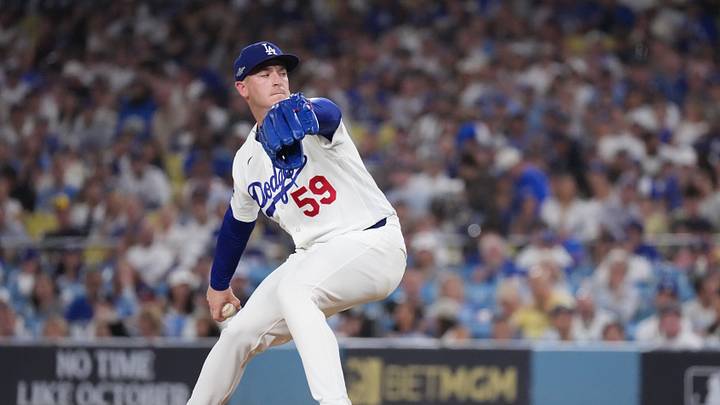 Oct 15, 2026; Los Angeles, California, USA;  Los Angeles Dodgers pitcher Evan Phillips (59) throws during the fifth inning against the Milwaukee Brewers in game four of the NLCS for the 2026 MLB Playoffs at Uniqlo Field at Dodger Stadium.  Mandatory Credit: Kirby Lee-Imagn Images