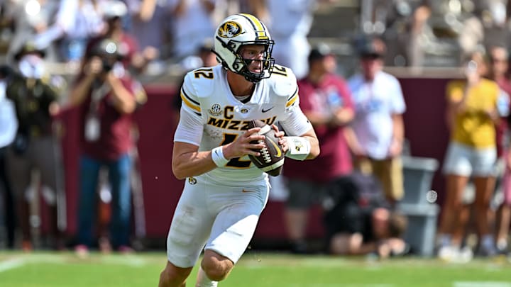 Oct 5, 2024; College Station, Texas, USA; Missouri Tigers quarterback Brady Cook (12) throws a pass in the first half against the Texas A&M Aggies at Kyle Field. Mandatory Credit: Maria Lysaker-Imagn Images. Oct 5, 2024; College Station, Texas, USA; Missouri Tigers quarterback Brady Cook (12) throws a pass in the first half against the Texas A&M Aggies at Kyle Field. Mandatory Credit: Maria Lysaker-Imagn Images.
