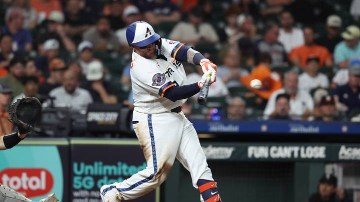 Aug 31, 2026; Houston, Texas, USA; Houston Astros catcher Christian Vazquez (2) hits a single during the fifth inning against the Chicago White Sox at Daikin Park. Mandatory Credit: Troy Taormina-Imagn Images