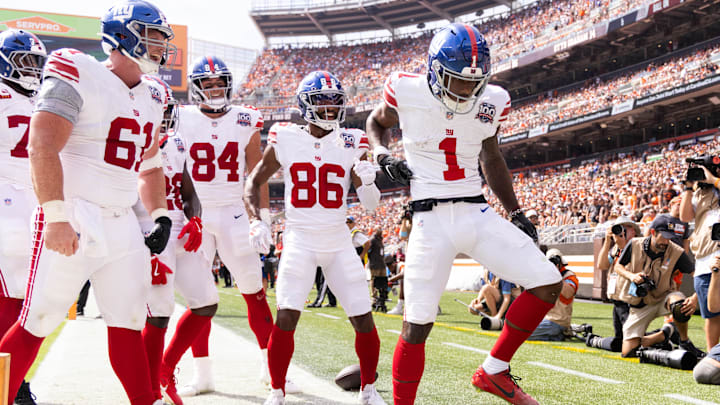 Sep 22, 2024; Cleveland, Ohio, USA; New York Giants wide receiver Malik Nabers (1) celebrates his touchdown with teammates against the Cleveland Browns during the second quarter at Huntington Bank Field.  