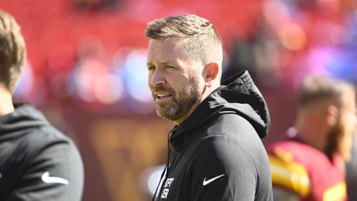 Oct 9, 2022; Landover, Maryland, USA; Washington Commanders offensive coordinator Scott Turner on the field before the game against the Tennessee Titans at FedExField. Mandatory Credit: Brad Mills-USA TODAY Sports