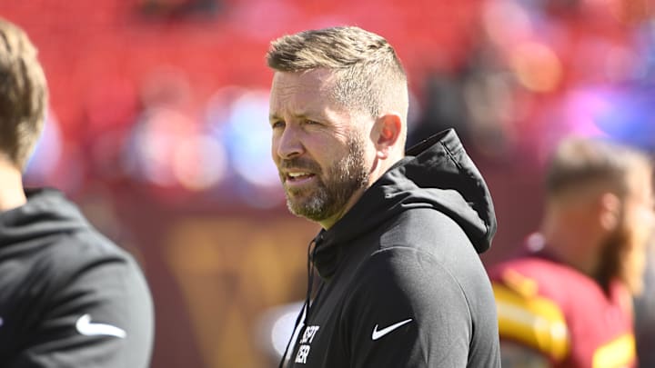 Oct 9, 2022; Landover, Maryland, USA; Washington Commanders offensive coordinator Scott Turner on the field before the game against the Tennessee Titans at FedExField. Mandatory Credit: Brad Mills-Imagn Images