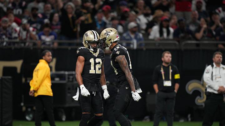 Oct 12, 2025; New Orleans, Louisiana, USA; New Orleans Saints wide receiver Chris Olave (12) and wide receiver Devaughn Vele (14) react during the first quarter against the New England Patriots at Caesars Superdome. Mandatory Credit: Matthew Hinton-Imagn Images Oct 12, 2025; New Orleans, Louisiana, USA; New Orleans Saints wide receiver Chris Olave (12) and wide receiver Devaughn Vele (14) react during the first quarter against the New England Patriots at Caesars Superdome. Mandatory Credit: Matthew Hinton-Imagn Images
