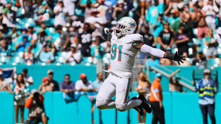 Sep 8, 2024; Miami Gardens, Florida, USA; Miami Dolphins linebacker Emmanuel Ogbah (91) celebrates after sacking Jacksonville Jaguars quarterback Trevor Lawrence (not pictured) during the fourth quarter at Hard Rock Stadium. Mandatory Credit: Sam Navarro-Imagn Images