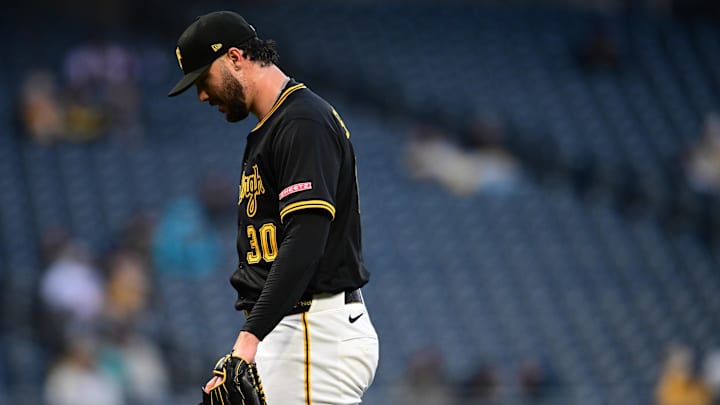 Pittsburgh Pirates starting pitcher Paul Skenes walks to the dugout.