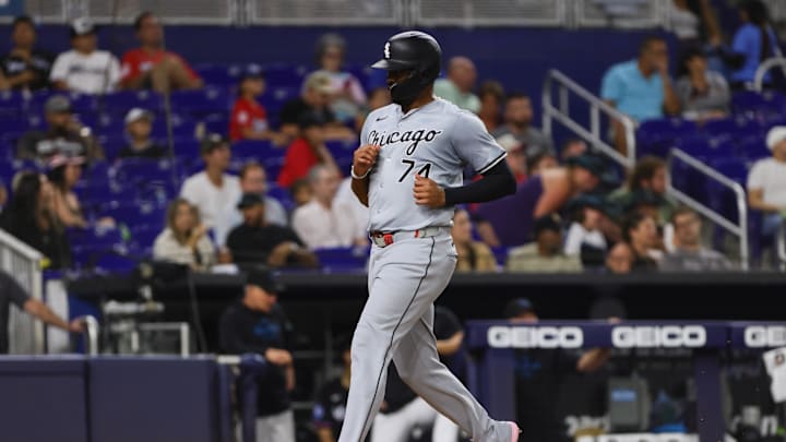 Chicago White Sox designated hitter Eloy Jimenez (74) scores against the Miami Marlins during the fifth inning at loanDepot Park in 2024.