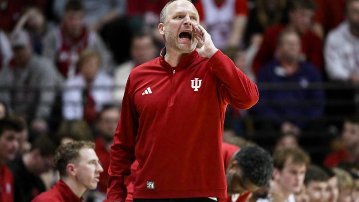Jan 4, 2026; Bloomington, Indiana, USA; Indiana Hoosiers head coach Darian Devries calls a play against the Washington Huskies during the first half at Simon Skjodt Assembly Hall. Mandatory Credit: Robert Goddin-Imagn Images
