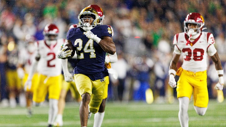 Notre Dame running back Jadarian Price (24) returns a kick for a touchdown in the second half of a NCAA football game against Southern California at Notre Dame Stadium on Saturday, Oct. 18, 2025, in South Bend.