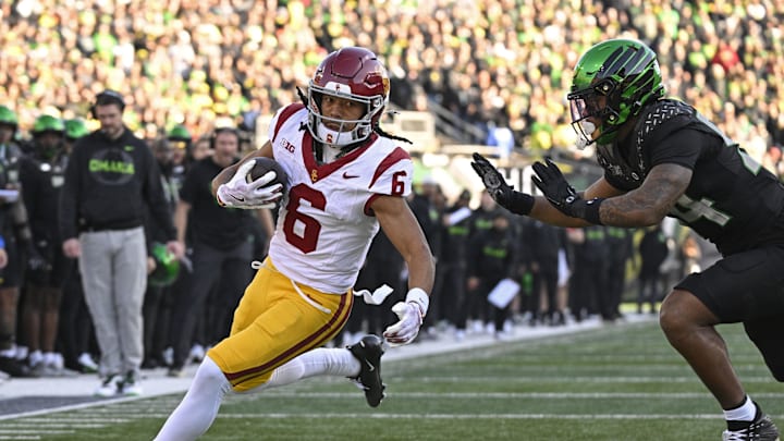 Nov 22, 2025; Eugene, Oregon, USA; Southern California Trojans wide receiver Makai Lemon (6) catches a pass for a touch down during the first half against the Oregon Ducks at Autzen Stadium. Mandatory Credit: Troy Wayrynen-Imagn Images