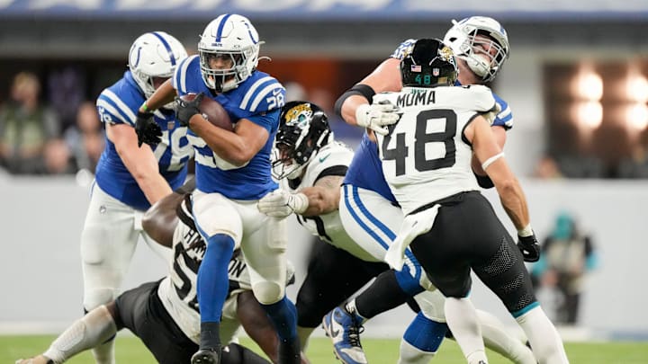 Indianapolis Colts running back Jonathan Taylor (28) rushes the ball Sunday, Jan. 5, 2025, during a game against the Jacksonville Jaguars at Lucas Oil Stadium in Indianapolis. Indianapolis Colts running back Jonathan Taylor (28) rushes the ball Sunday, Jan. 5, 2025, during a game against the Jacksonville Jaguars at Lucas Oil Stadium in Indianapolis.