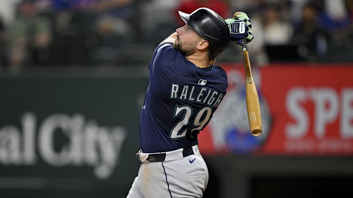 Jun 28, 2025; Arlington, Texas, USA; Seattle Mariners catcher Cal Raleigh (29) bats during the game between the Texas Rangers and the Seattle Mariners at Globe Life Field. Mandatory Credit: Jerome Miron-Imagn Images
