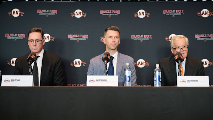 Oct 1, 2024; San Francisco, CA, USA; San Francisco Giants manager Bob Melvin (left), president of baseball operations Buster Posey (middle), and chairman Greg Johnson during a press conference at Oracle Park.  Mandatory Credit: Robert Edwards-Imagn Images