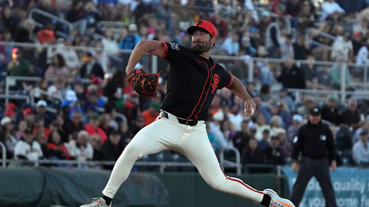 San Francisco Giants pitcher Robbie Ray (38) throws against the San Diego Padres in the first inning at Scottsdale Stadium on March 18. San Francisco Giants pitcher Robbie Ray (38) throws against the San Diego Padres in the first inning at Scottsdale Stadium on March 18.
