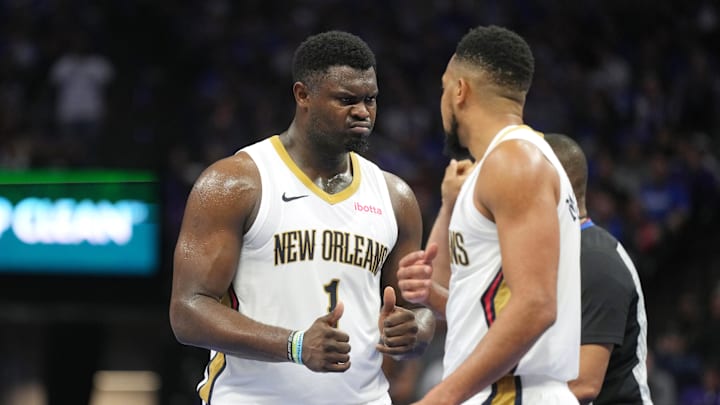 Dec 4, 2023; Sacramento, California, USA; New Orleans Pelicans forward Zion Williamson (1) gestures while talking with guard CJ McCollum (right) during the fourth quarter against the Sacramento Kings at Golden 1 Center. Mandatory Credit: Darren Yamashita-Imagn Images
