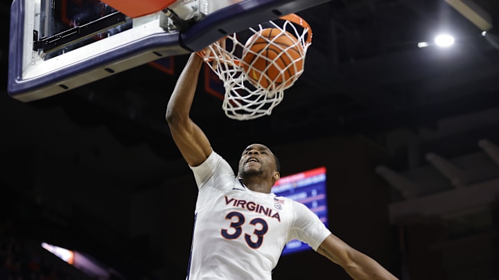 Jan 7, 2026; Charlottesville, Virginia, USA; Virginia Cavaliers center Ugonna Onyenso (33) dunks the ball against the California Golden Bears during the second half at John Paul Jones Arena. Mandatory Credit: Amber Searls-Imagn Images Jan 7, 2026; Charlottesville, Virginia, USA; Virginia Cavaliers center Ugonna Onyenso (33) dunks the ball against the California Golden Bears during the second half at John Paul Jones Arena. Mandatory Credit: Amber Searls-Imagn Images
