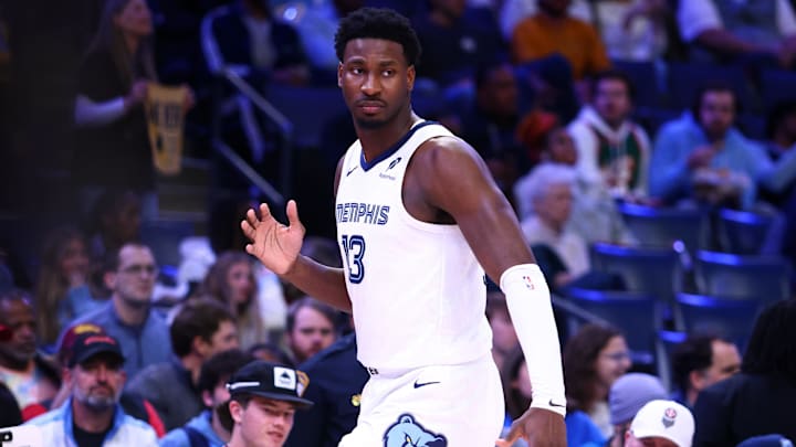 Mar 3, 2025; Memphis, Tennessee, USA; Memphis Grizzlies forward Jaren Jackson Jr. (13) stretches prior to the game against the Atlanta Hawks at FedExForum. Mandatory Credit: Petre Thomas-Imagn Images