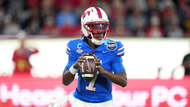 Jan 2, 2026; San Diego, CA, USA; SMU Mustangs quarterback Kevin Jennings (7) throws the ball against the Arizona Wildcats in the first half during the Holiday Bowl. Mandatory Credit: Kirby Lee-Imagn Images
