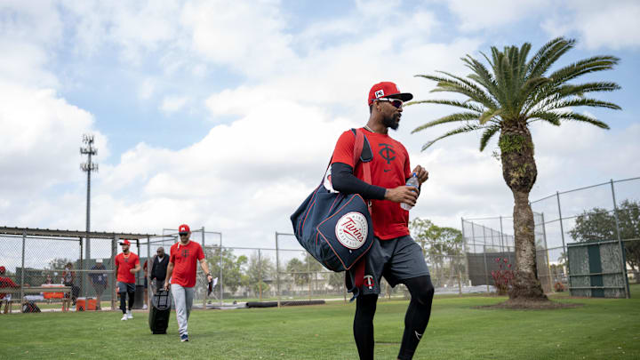 Feb 18, 2025; Lee County, FL, USA; Minnesota Twins center fielder Byron Buxton (25) walks to the field during the teamís spring training at the Lee Health Sports Complex . Credit: Chris Tilley-Imagn Images