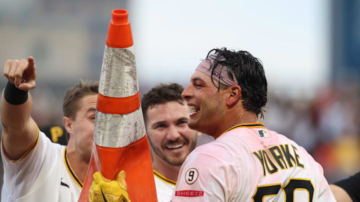 Apr 4, 2026; Pittsburgh, Pennsylvania, USA;  Pittsburgh Pirates designated hitter Nick Yorke (38) celebrates with a traffic cone after Yorke hit  a game winning walk-off single to defeat the Baltimore Orioles in the ninth inning at PNC Park. Mandatory Credit: Charles LeClaire-Imagn Images