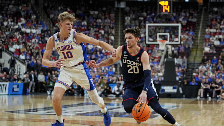 Connecticut Huskies guard Aidan Mahaney (20). 