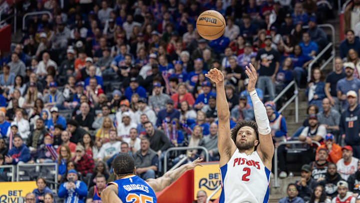 Apr 27, 2025; Detroit, Michigan, USA; Detroit Pistons guard Cade Cunningham (2) shoots the ball as New York Knicks forward Mikal Bridges (25) defends during the fourth quarter of game four of first round for the 2025 NBA Playoffs at Little Caesars Arena. Mandatory Credit: David Reginek-Imagn Images