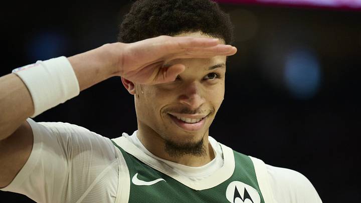 Milwaukee Bucks guard Ryan Rollins (13) salutes a fan during the first half against the Portland Trail Blazers at Moda Center on March 25, 2026.
