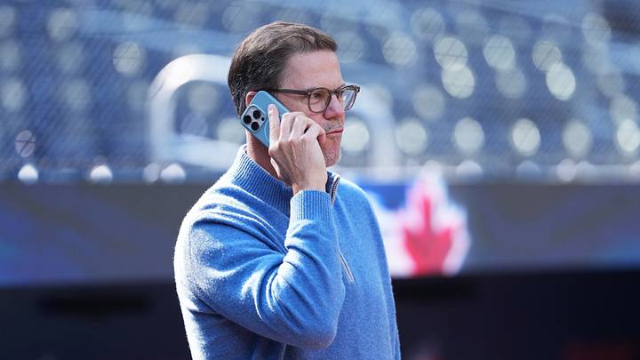 Sep 12, 2025; Toronto, Ontario, CAN; Toronto Blue Jays general manager Ross Atkins talks on the phone during batting practice before a game against the Baltimore Orioles at Rogers Centre. Mandatory Credit: Nick Turchiaro-Imagn Images Sep 12, 2025; Toronto, Ontario, CAN; Toronto Blue Jays general manager Ross Atkins talks on the phone during batting practice before a game against the Baltimore Orioles at Rogers Centre. Mandatory Credit: Nick Turchiaro-Imagn Images
