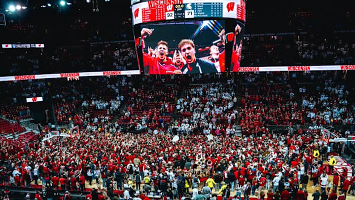 Wisconsin fans storm the court after the Badgers' 92-71 win over No.10 Michigan State on February 13, 2026.
