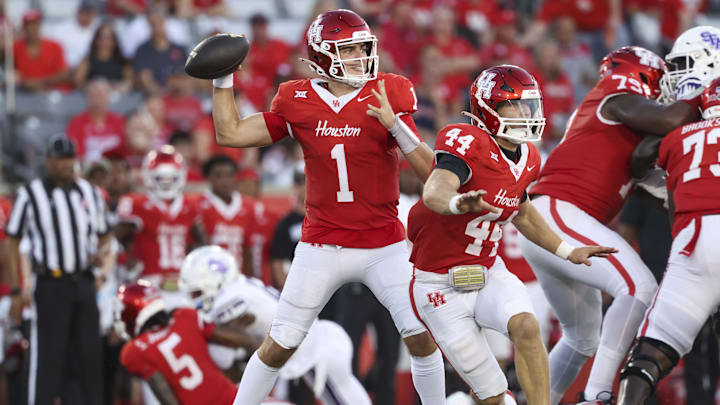 Aug 28, 2025; Houston, Texas, USA; Houston Cougars quarterback Conner Weigman (1) attempts a pass during the first quarter against the Stephen F. Austin Lumberjacks at TDECU Stadium. Mandatory Credit: Troy Taormina-Imagn Images