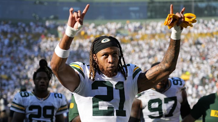 Oct 20, 2024; Green Bay, Wisconsin, USA;  Green Bay Packers cornerback Eric Stokes (21) celebrates as he leaves the field following the game against the Houston Texans at Lambeau Field. Mandatory Credit: Jeff Hanisch-Imagn Images