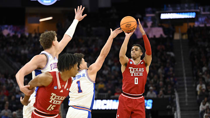 Mar 29, 2025; San Francisco, CA, USA; Texas Tech Red Raiders guard Chance McMillian (0) shoots a three point basket over Florida Gators guard Walter Clayton Jr. (1) during the second half during the West Regional final of the 2025 NCAA tournament at Chase Center. McMillian is reportedly going to sign a free-agent contract with the Golden State Warriors