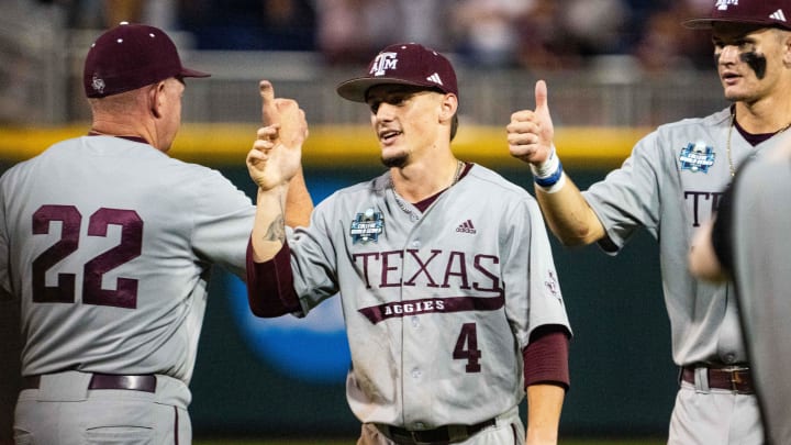Jun 17, 2024; Omaha, NE, USA; Texas A&M Aggies center fielder Travis Chestnut (4) congratulates teammates after defeating the Kentucky Wildcats at Charles Schwab Field Omaha. Mandatory Credit: Dylan Widger-USA TODAY Sports Jun 17, 2024; Omaha, NE, USA; Texas A&M Aggies center fielder Travis Chestnut (4) congratulates teammates after defeating the Kentucky Wildcats at Charles Schwab Field Omaha. Mandatory Credit: Dylan Widger-USA TODAY Sports