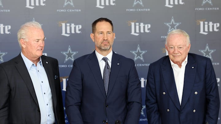 Jan 27, 2025; Frisco, TX, USA;   (L to R) Dallas Cowboys CEO Stephen Jones,head coach Brian Schottenheimer and owner Jerry Jones pose for pictures after a press conference at the Star.  Mandatory Credit: Tim Heitman-Imagn Images