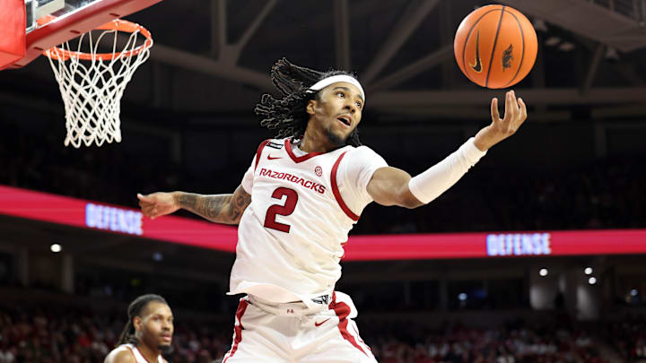 Jan 8, 2025; Fayetteville, Arkansas, USA; Arkansas Razorbacks guard Boogie Fland (2) rebounds int he first half against the Ole Miss Rebels at Bud Walton Arena. Mandatory Credit: Nelson Chenault-Imagn Images