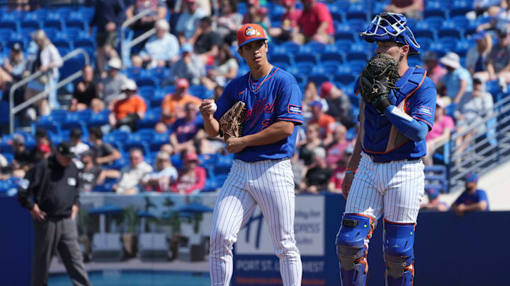 Feb 25, 2026; Port St. Lucie, Florida, USA;  New York Mets pitcher Jonah Tong (21) talks with catcher Hayden Senger (6) after giving up a three-run home run in the third inning to the St. Louis Cardinals at Clover Park. Mandatory Credit: Jim Rassol-Imagn Images