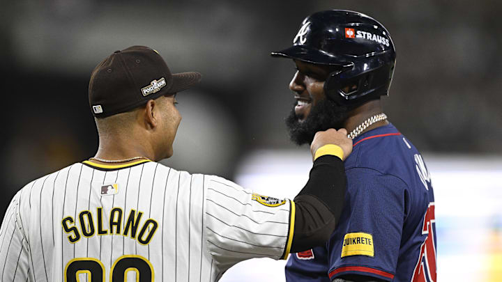 San Diego Padres third baseman Donovan Solano (39) and Atlanta Braves designated hitter Marcell Ozuna (20) talk during the sixth inning of game two in the Wildcard round for the 2024 MLB Playoffs at Petco Park on Oct. 2, 2024.