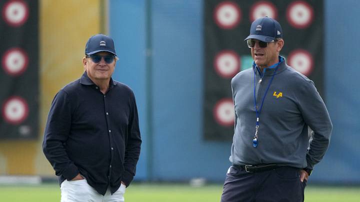 Los Angeles Chargers owner Dean Spanos (left) and coach Jim Harbaugh Los Angeles Chargers owner Dean Spanos (left) and coach Jim Harbaugh