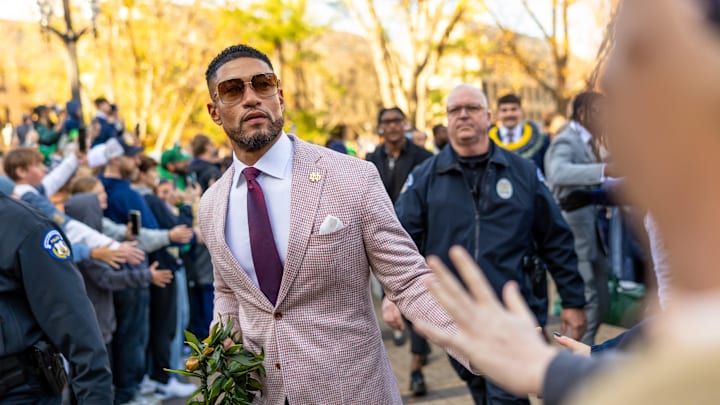 Rumors continue to swirl around a top head coach despite a denial of interest in a different job.