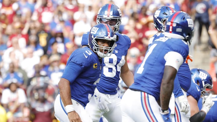 Sep 7, 2025; Landover, Maryland, USA; New York Giants quarterback Russell Wilson (3) speaks to teammates prior to a snap during the third quarter against the Washington Commanders at Northwest Stadium.  