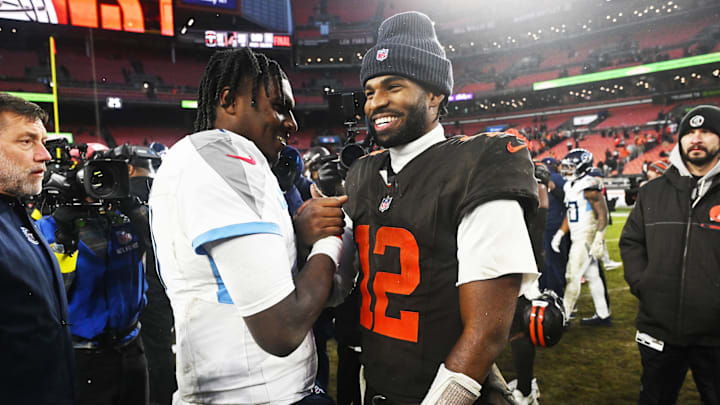 Dec 7, 2025; Cleveland, Ohio, USA; Cleveland Browns quarterback Shedeur Sanders (12) shakes hands with Tennessee Titans quarterback Cam Ward (1) after the game at Huntington Bank Field. Mandatory Credit: Ken Blaze-Imagn Images Dec 7, 2025; Cleveland, Ohio, USA; Cleveland Browns quarterback Shedeur Sanders (12) shakes hands with Tennessee Titans quarterback Cam Ward (1) after the game at Huntington Bank Field. Mandatory Credit: Ken Blaze-Imagn Images