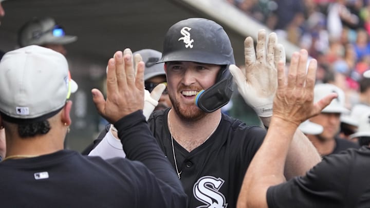 Feb 23, 2024; Mesa, Arizona, USA; Chicago White Sox designated hitter Tim Elko (91) celebrates with teammates after hitting a solo home run against the Chicago Cubs in the second inning at Sloan Park. Mandatory Credit: Rick Scuteri-Imagn Images